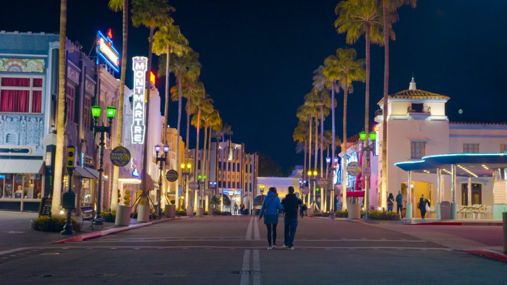 Couple walks down an empty Hollywood Boulevard in Universal Studios Florida