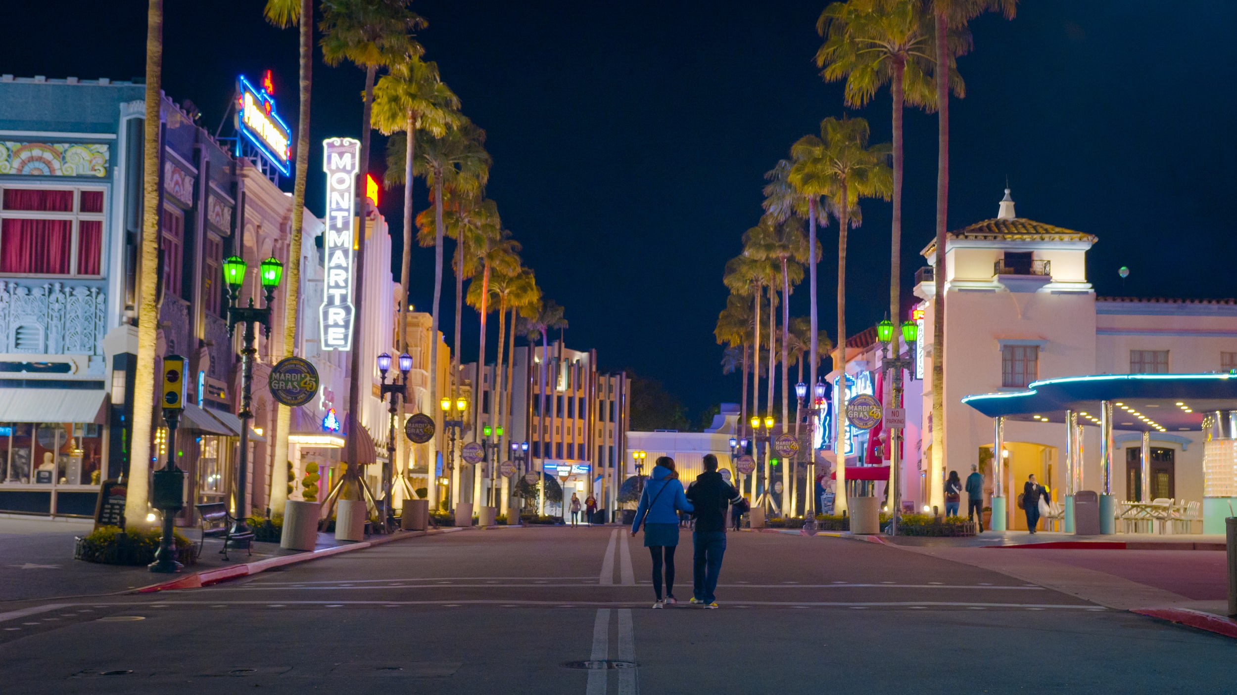 Couple walking through Hollywood during an OI Meetup