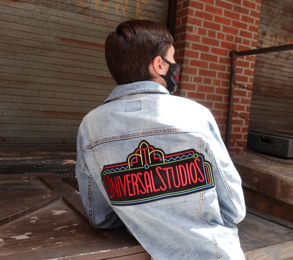 Taylor Strickland wearing a retro 30th anniversary jean jacket