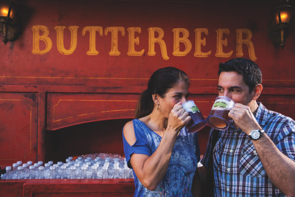 Couple drinking Butterbeer in Hogsmeade village